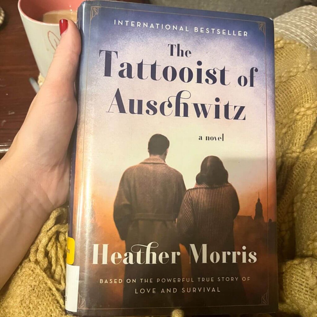 girl holding book