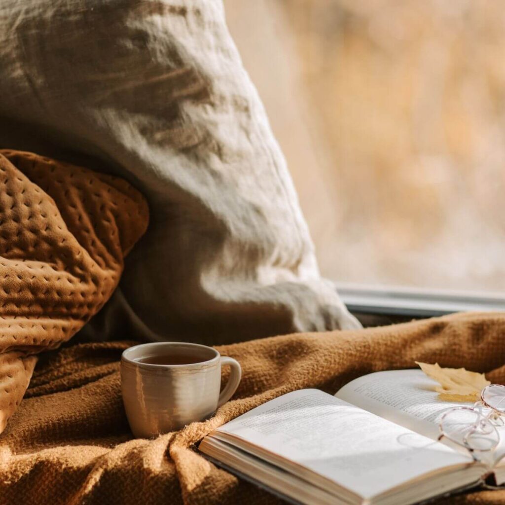 pillows, tea, and a book
